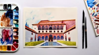 Bright watercolour painting of the Court of the Myrtles at the Alhambra, Granada by Emma Bolton. Watercolour palette and brush.